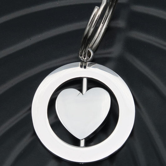 Porte-clés personnalisé gravure "Spinning heart" avec gravure des deux côtés des initiales pour les couples